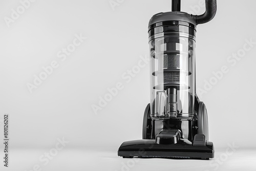 A powerful upright vacuum cleaner with a bagless design and HEPA filtration system isolated on a solid white background. photo