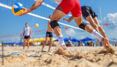 Beach volleyball player s feet jumping for block   summer olympics agility and timing photo