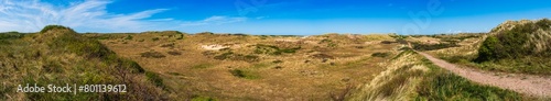 Hike in the dunes of Egfmond aan Zee on a sunny day photo