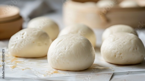 Fresh steamed buns on a marble countertop. Food photography suitable for design