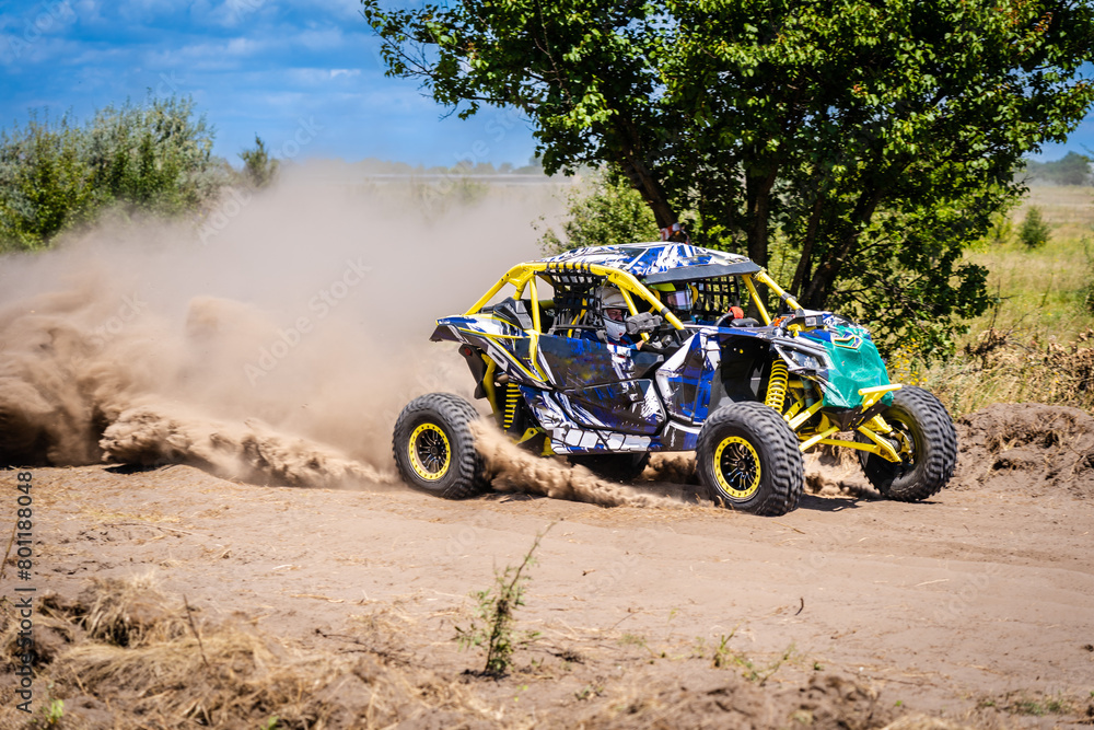 UTV kicking up sand on a dune. Extreme. 4x4. UTV kicking up sand on a dune. Extreme. 4x4.