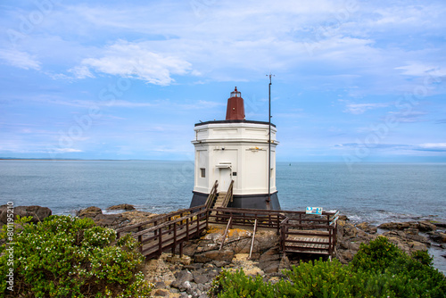 Stirling Point Lighthouse located at the beginning (or end) of New Zealand's State Highway 1, in the small township of Bluff.  photo