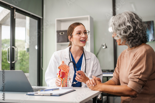 Caucasian woman and elderly Asian woman discuss health issues cold, influenza, pneumonia, bronchitis, stomach disease, GERD, IBS, inflammatory bowel disease, gallstones, chronic constipation