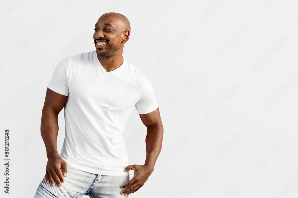 Men's casual clothing in white, smiling African American man Men's casual clothing in white, smiling African American man