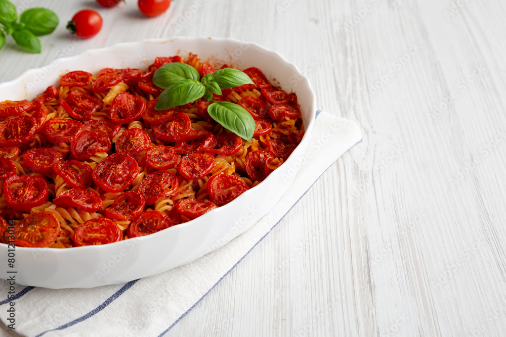Homemade Easy Tomato Basil Pasta Bake, side view. Copy space. Homemade Easy Tomato Basil Pasta Bake, side view. Copy space.