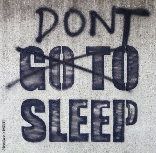 Dont go to sleep graffiti art on white wall background
