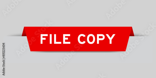 Red color inserted label with word file copy on gray background