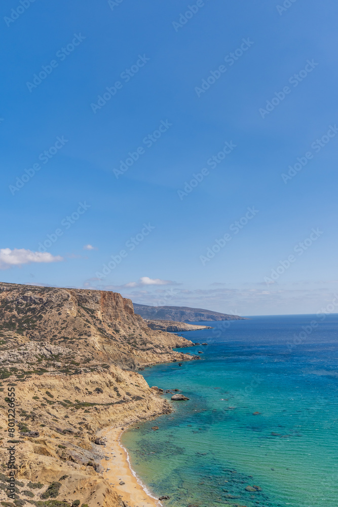Vertical view of beautiful cliffs with blue sea. Summer background. Vertical view of beautiful cliffs with blue sea. Summer background.