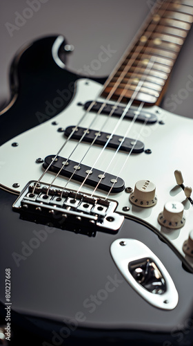 Close-Up View of Retro-Style Electric Guitar in High-Gloss Black Finish