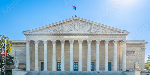 Assemblee Nationale name of the facade of the building in Paris, France on a sunny day