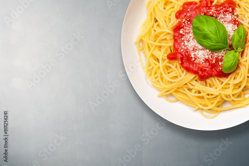 iitalian spaghetti with basil and tomato photo