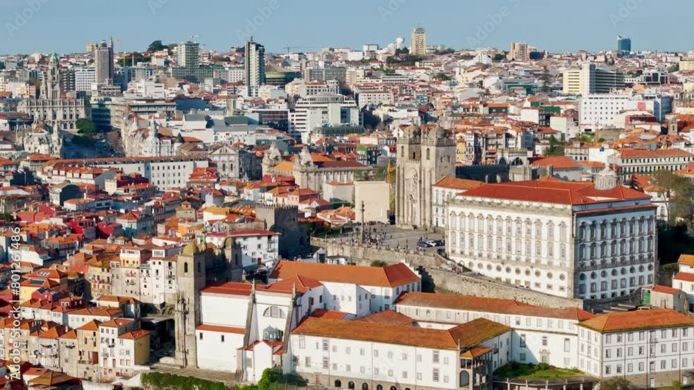 Famous historic Portuguese town of Porto in the sunny day, with Porto Cathedral in downtown Porto. Aerial view Famous historic Portuguese town of Porto in the sunny day, with Porto Cathedral in downtown Porto. Aerial view