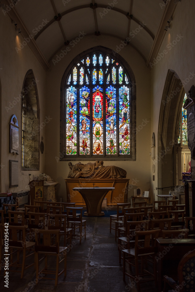 Obraz premium Jesse and the Jesse Window, in the Abergavenny Priory Church of St Mary, a quiet place of pray next to the busy market town.