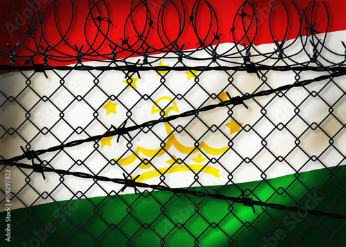 Tajikistan flag behind barbed wire and metal fence