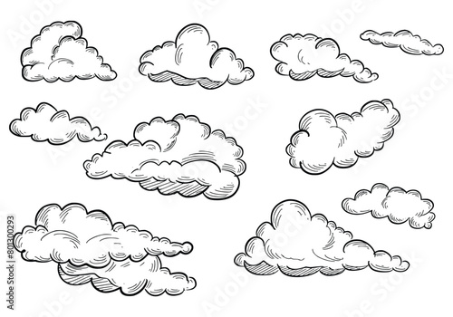 Set of clouds in hand drawn sketch design