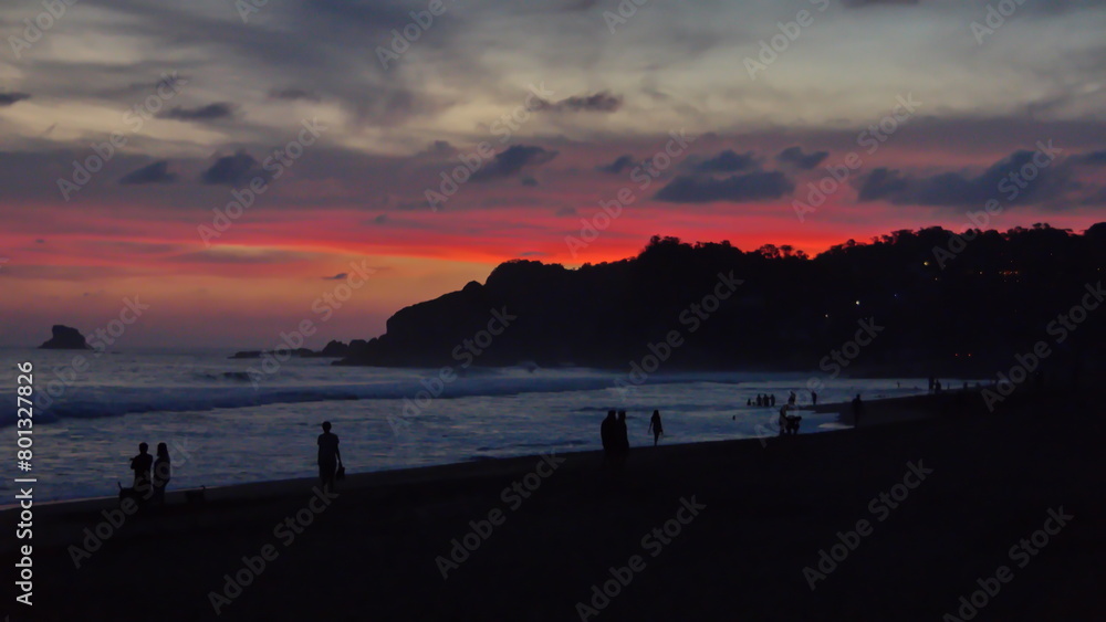 Sunset over the beach in Zipolite, Mexico Sunset over the beach in Zipolite, Mexico