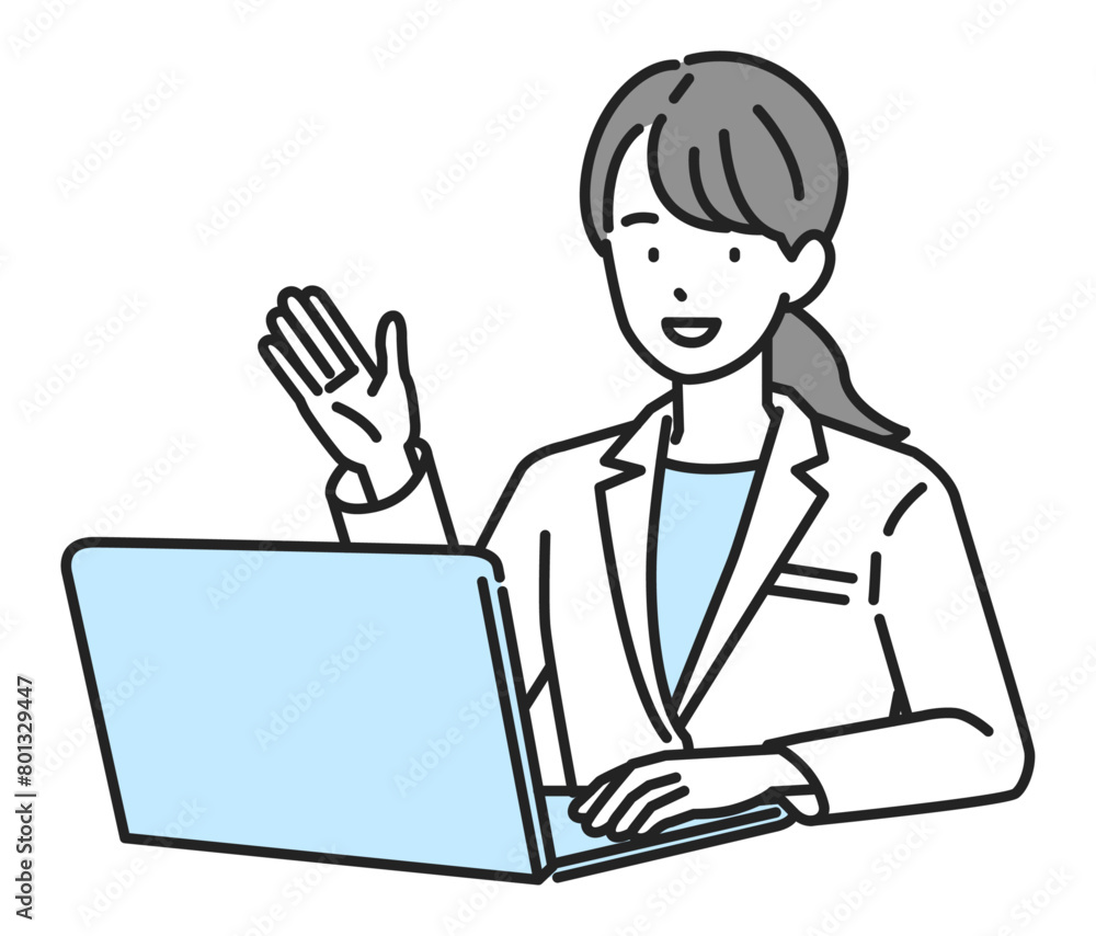 パソコンを操作する白衣の女性医療スタッフ