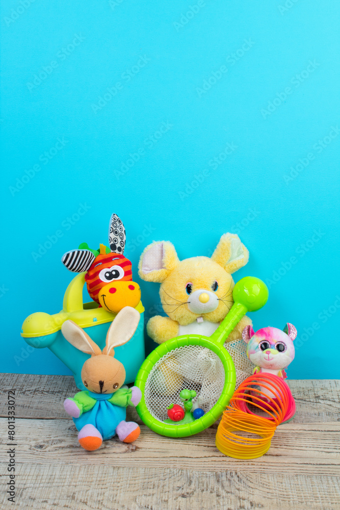 Obraz premium Collection of colorful toys on blue background.