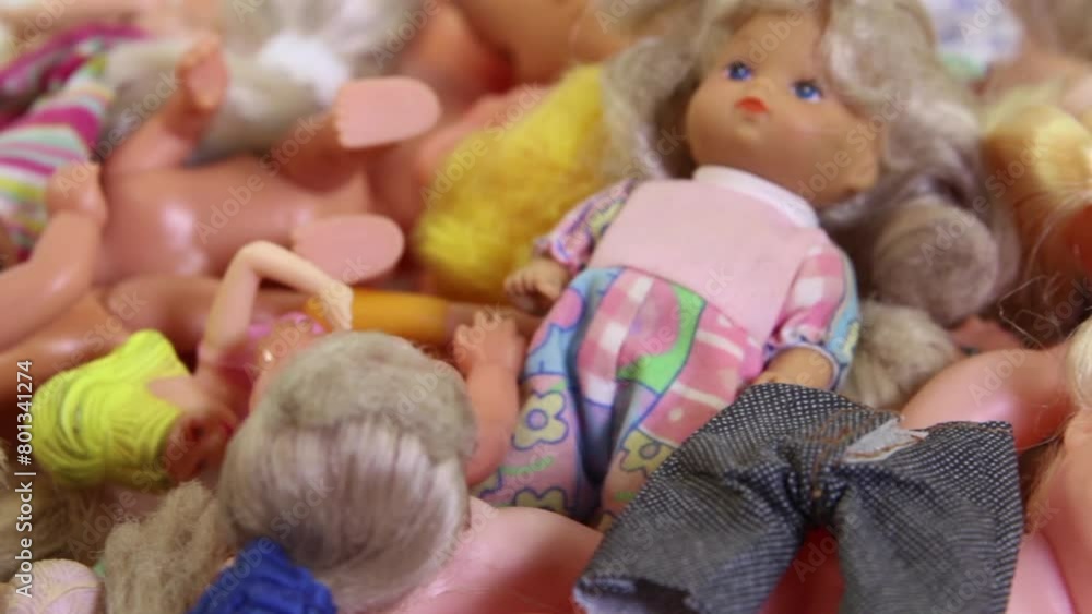 A lot of the old simple cheap plastic and rubber dolls A lot of the old simple cheap plastic and rubber dolls