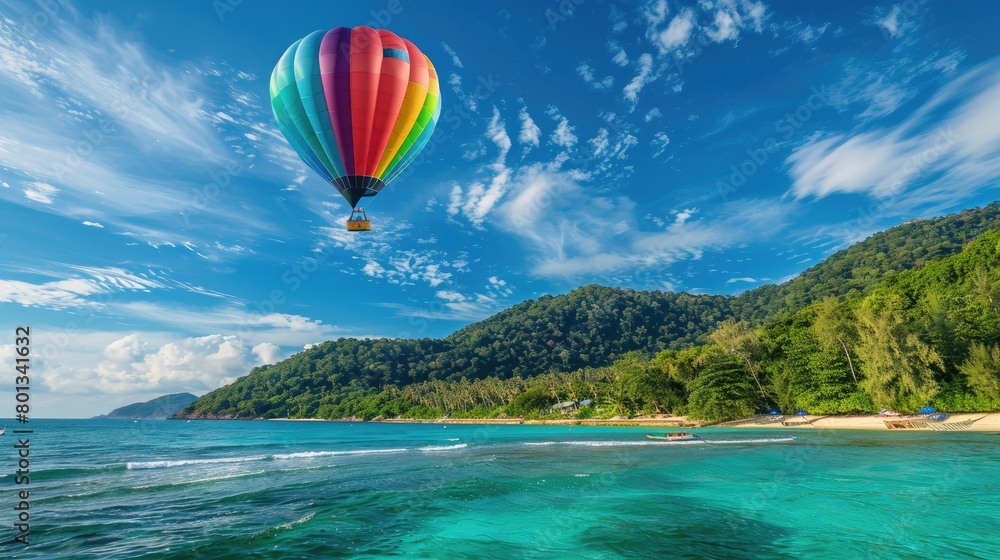 Hot air balloon floating over island with copy space area. Hot air balloon floating over island with copy space area.