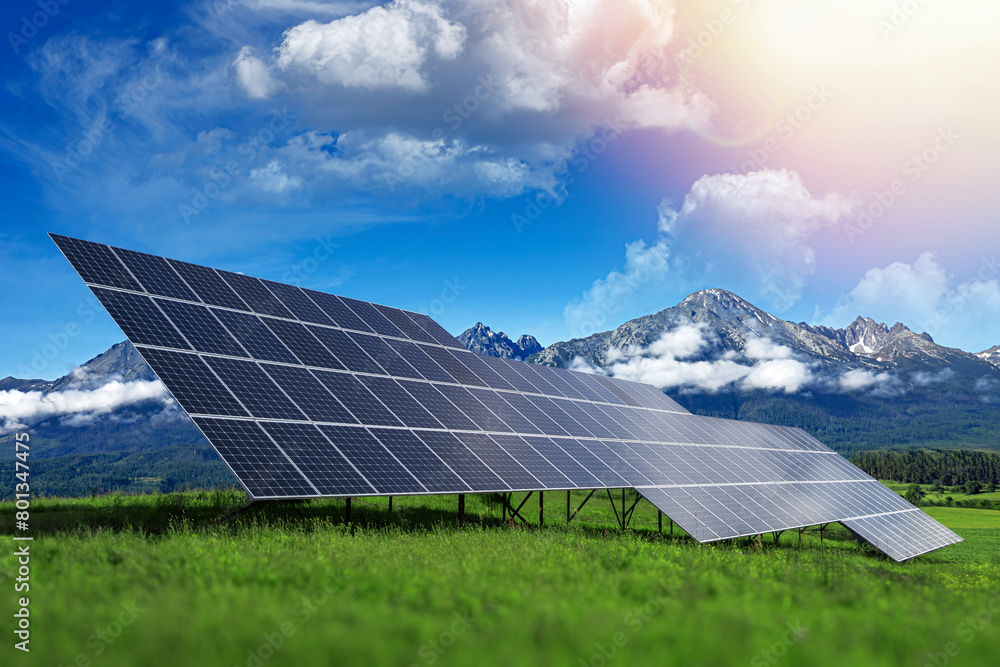 Solar panels of a power plant against a background of beautiful nature.