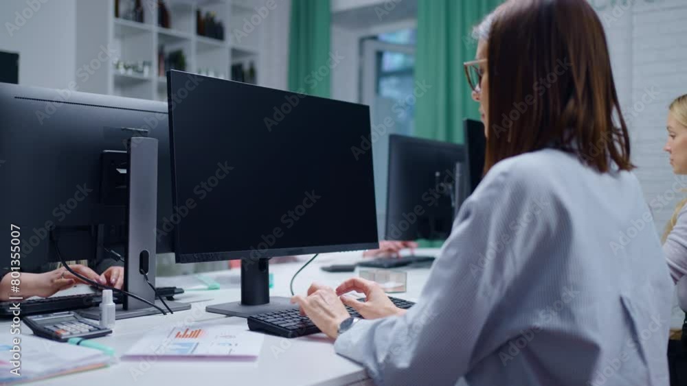 Young Adult Women In Modern Office Of Software Development Company, Workers Typing Program Code Young Adult Women In Modern Office Of Software Development Company, Workers Typing Program Code
