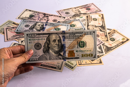 Cash of dollar note, dollar background. Lot of one hundred dollar bills close-up. dollars in wallet on white background