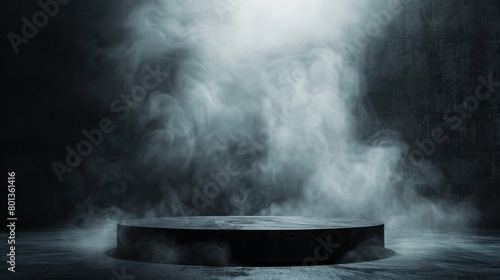 A spotlight shines down on an empty pedestal surrounded by smoke.