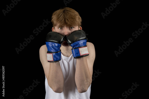 A Teenage Male Boxer and Black Background © Ben Gingell