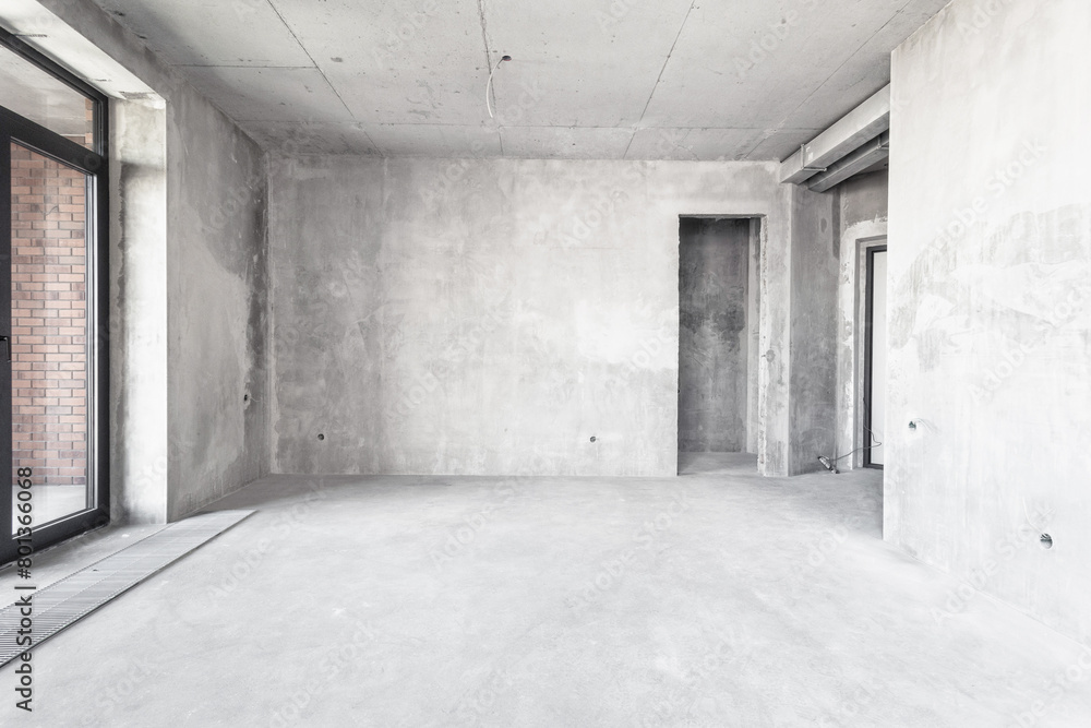 interior of the apartment without decoration in gray colors. rough finish interior of the apartment without decoration in gray colors. rough finish