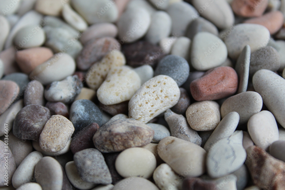 Background texture of pebbles or small river stone, flat lay or top view Background texture of pebbles or small river stone, flat lay or top view