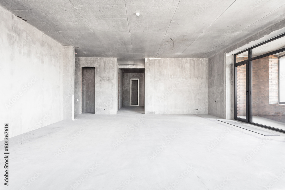 interior of the apartment without decoration in gray colors. rough finish