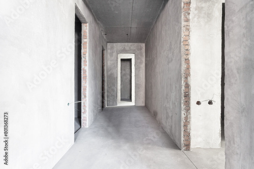 interior of the apartment without decoration in gray colors. rough finish © gluschenkoart