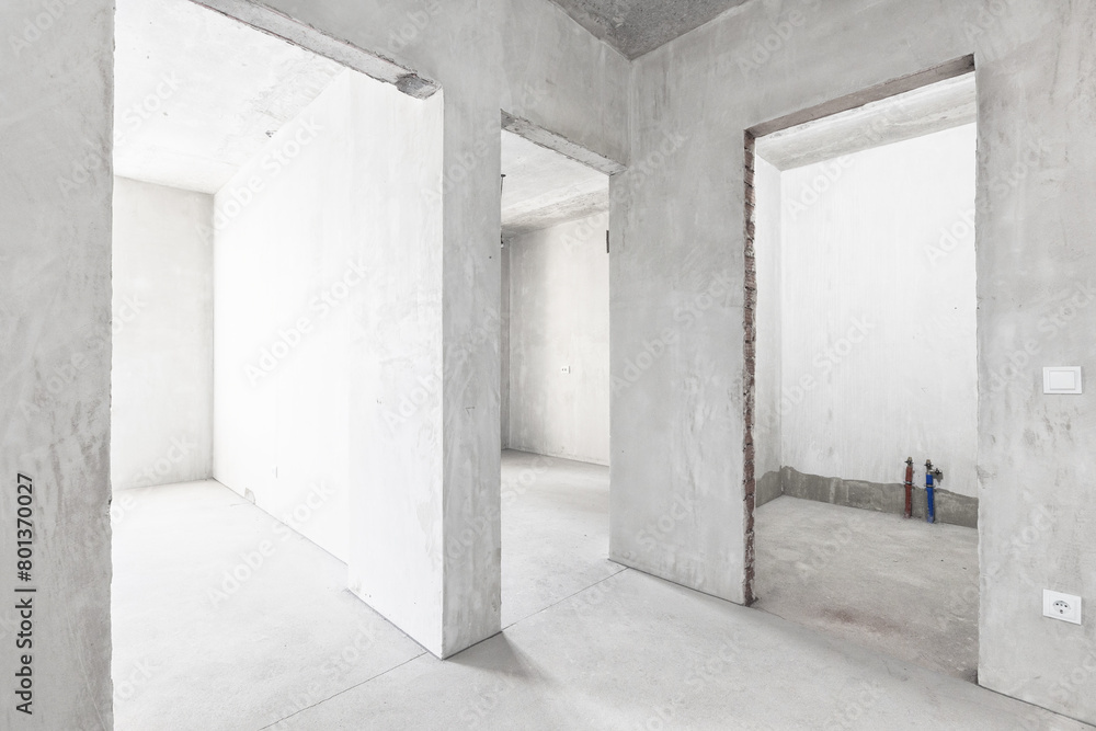 interior of the apartment without decoration in gray colors. rough finish interior of the apartment without decoration in gray colors. rough finish