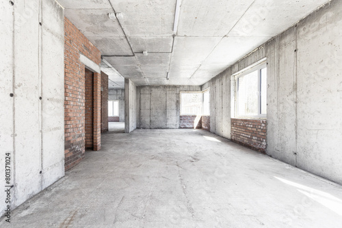 interior of the apartment without decoration in gray colors. rough finish