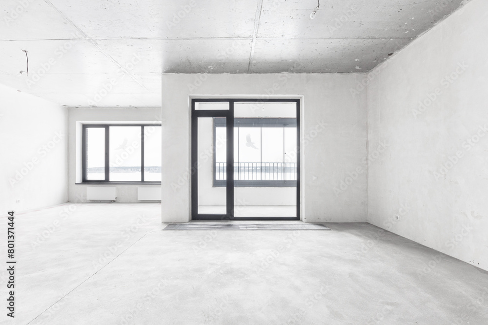 Fototapeta premium interior of the apartment without decoration in gray colors. rough finish