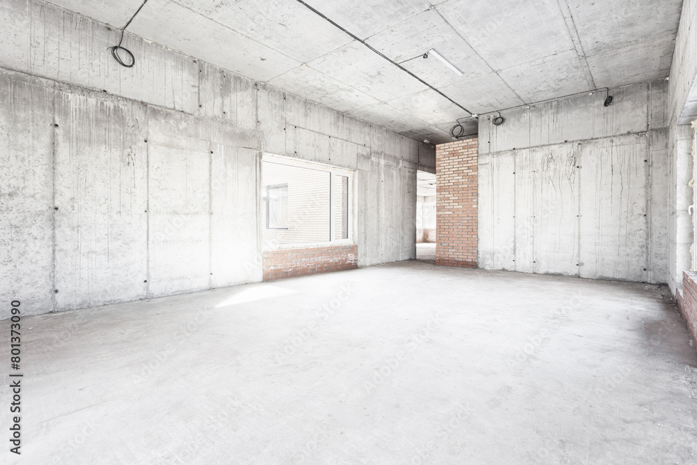 interior of the apartment without decoration in gray colors. rough finish interior of the apartment without decoration in gray colors. rough finish