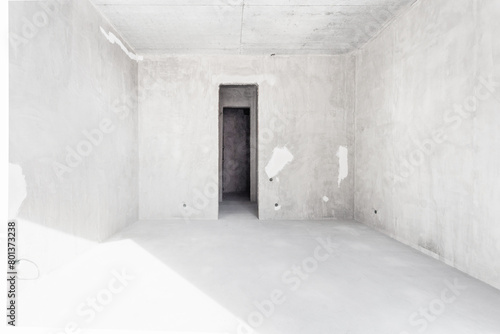 interior of the apartment without decoration in gray colors. rough finish