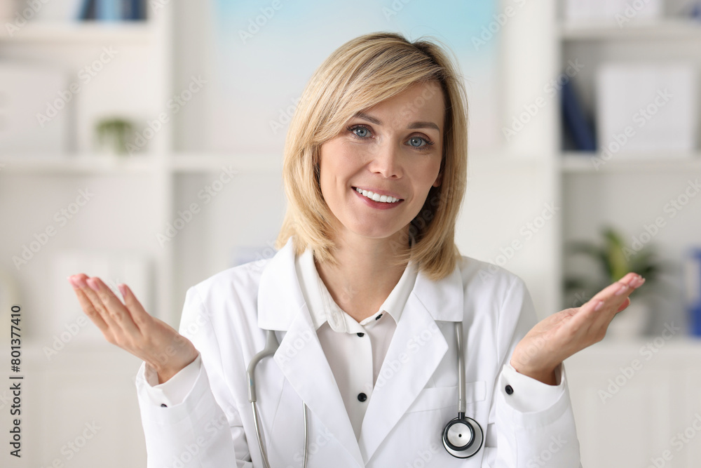 Portrait of smiling doctor on blurred background Portrait of smiling doctor on blurred background