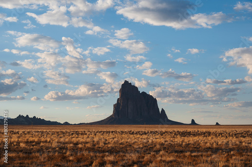 Usa, New Mexico, Shiprock, Clouds over desert landscape with Shiprock photo