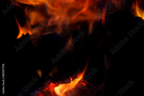 Fire flames with wood in fireplace