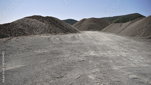 mounds of piled earth gravel as a background