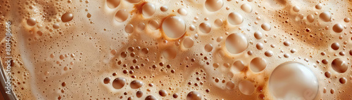 Frothy Latte Art: Close-Up of Textured and Frothy Latte Art in Coffee Beverage