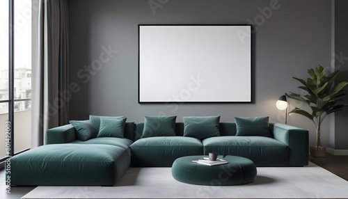 A modern living room with a large gray sectional sofa  green accent pillows  and a blank framed wall art above the sofa