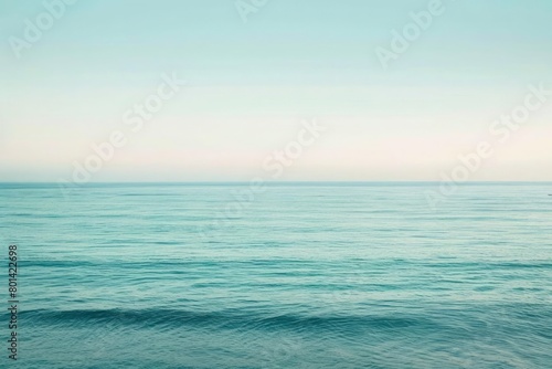 A horizontal gradient of ocean blues  merging into a soft mint green for a refreshing backdrop