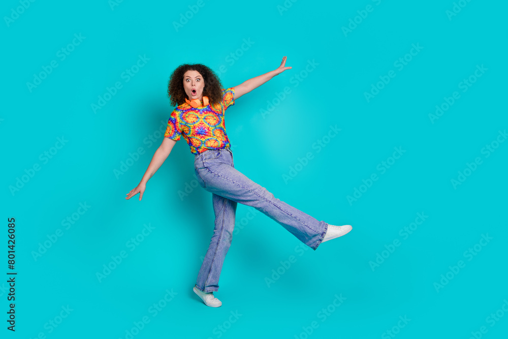 Photo of cheerful pretty woman wear stylish print clothes dance night club isolated on cyan color background