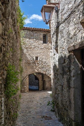 Sauve, France - 04 16 2024: Panoramic View of a typical white Occitan stone passage of the Village on the hill .