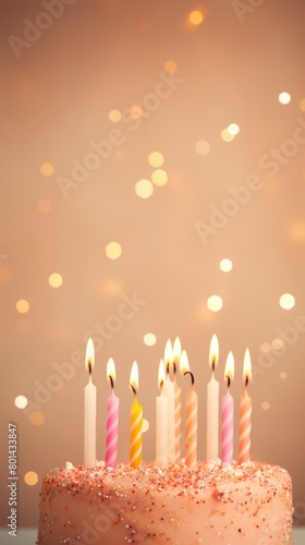 Tan background with birthday cake with candles pastel backdrop empty blank copyspace for design text photo website web banner backdrop texture 