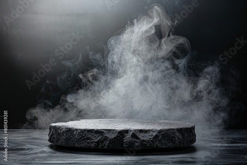 A black stone slab with smoke rising from it