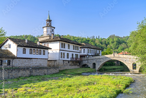 The old bridge and traditional Bulgarian houses in the old town of Tryavna, Bulgaria photo